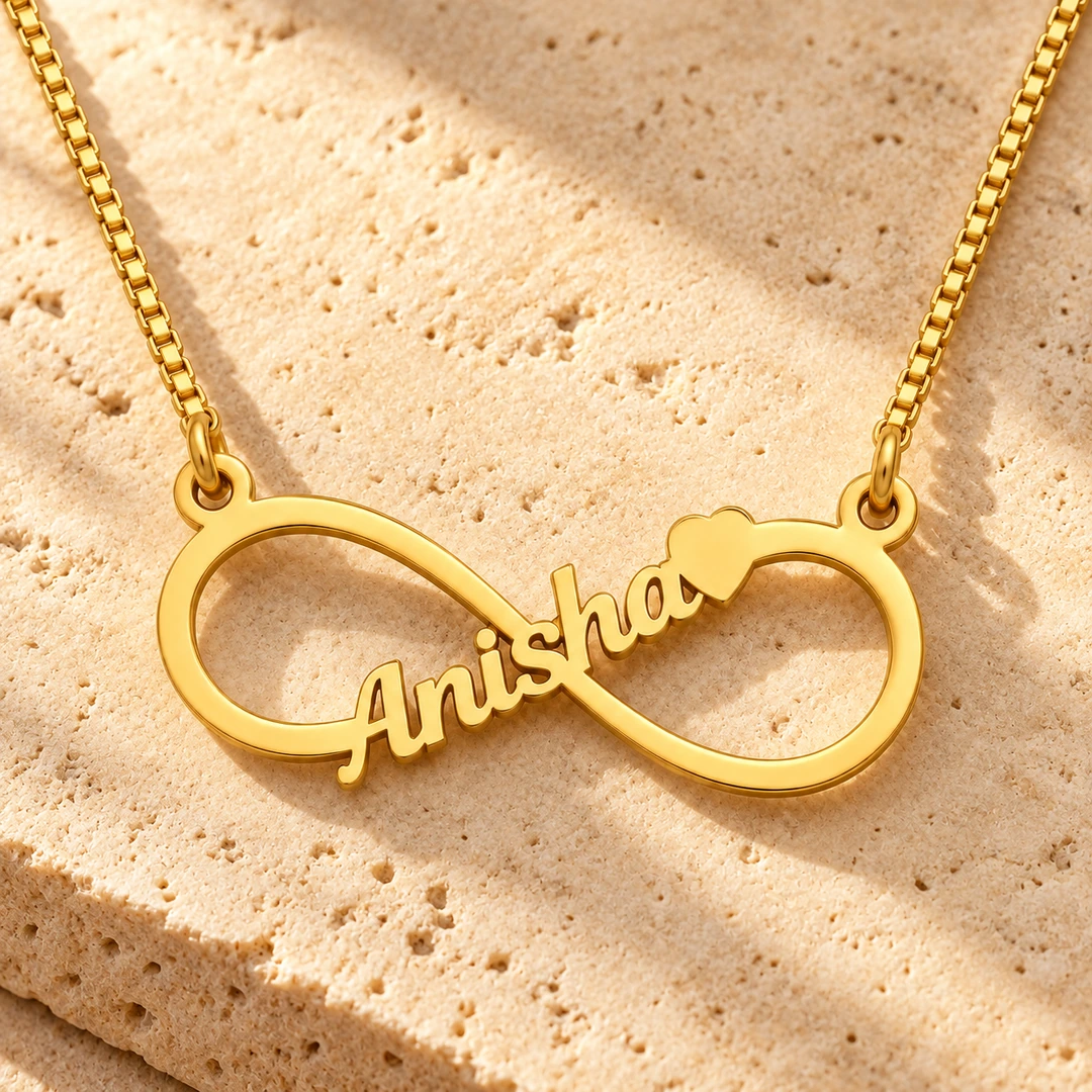 Personalized Infinity Name Necklace - On a rough stone surface Personalized Infinity Name Necklace on a rough stone surface