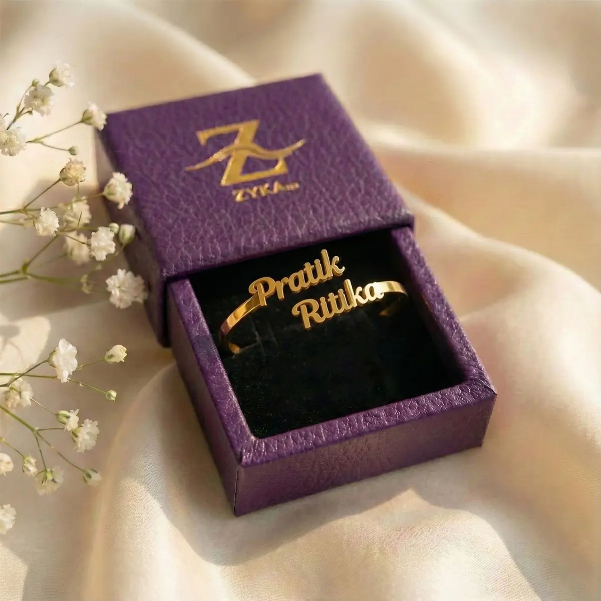 Personalized Couple Name Bracelet - In a purple display box Personalized Couple Name Bracelet in a purple display box
