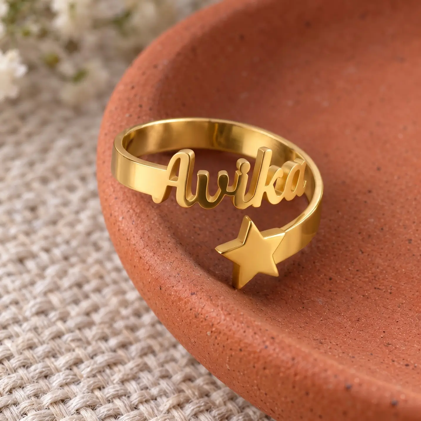 Personalized Star Name Ring – Image 5 Personalized Star Name Ring displayed on a terracotta dish