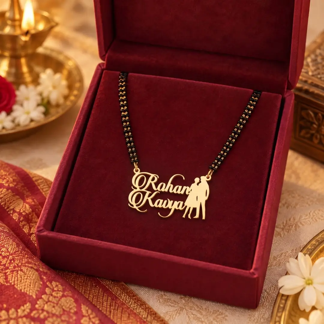 Standing Couple Name Mangalsutra Pendant - With a black-beaded chain in a red display box Standing Couple Name Mangalsutra Pendant with a black-beaded chain in a red display box